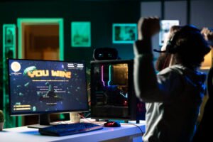 Cheerful player throwing victorious fist in air after beating SF videogame